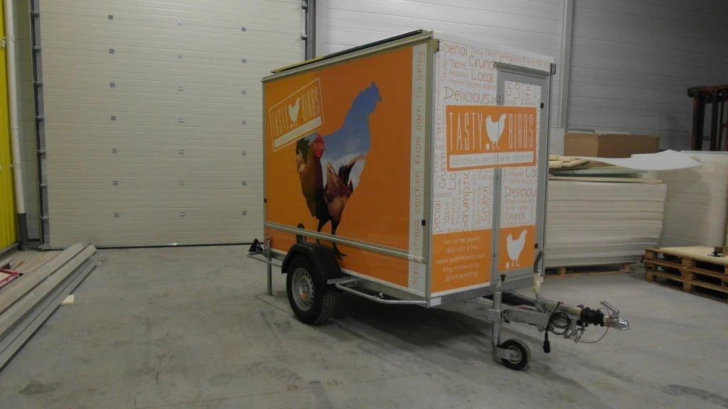 The Tastybirds branded orange trailer